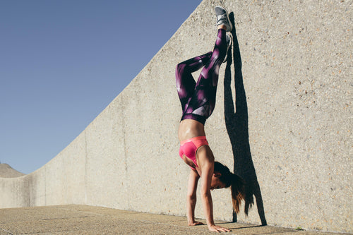 girl doing a handstand